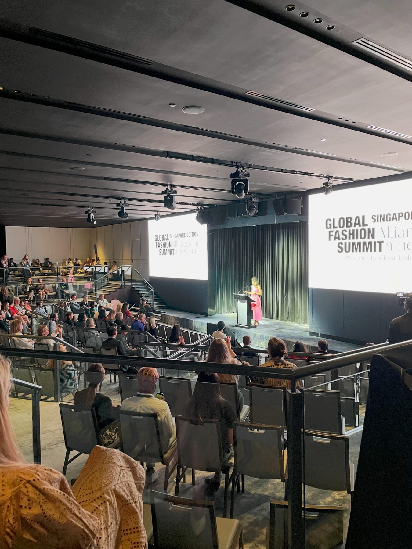 Marianne Hughes speaking on stage at Global Fashion Summit: Singapore Edition 2022